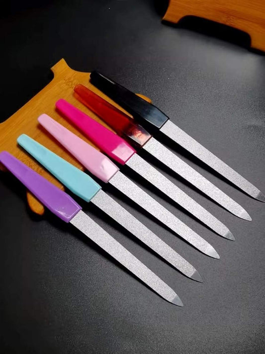 Set of metal nail files with diamond-grit pads and assorted colored handles.
