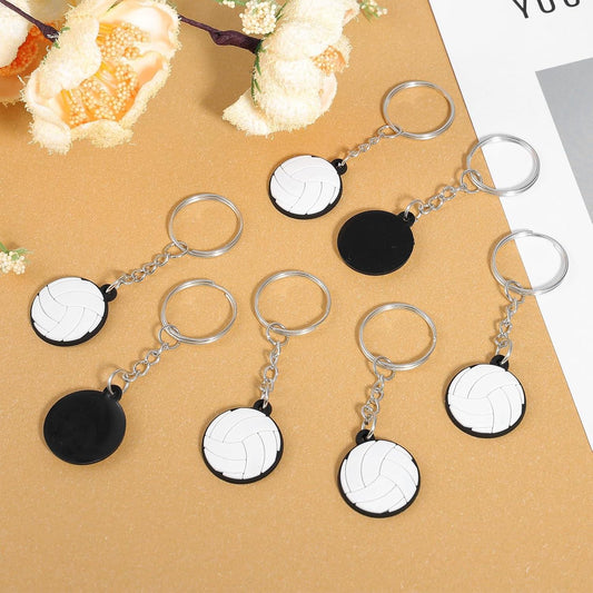 Volleyball keychain charms with metal rings and black and white volleyball discs