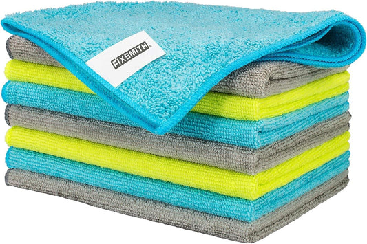 Stack of microfiber cleaning cloths in blue, gray, and lime with stitched edge