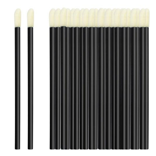 Pack of disposable lip brushes with black handles and white foam tips