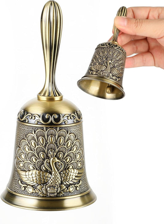 Brass handbell with ornate floral eagle design and flared rim