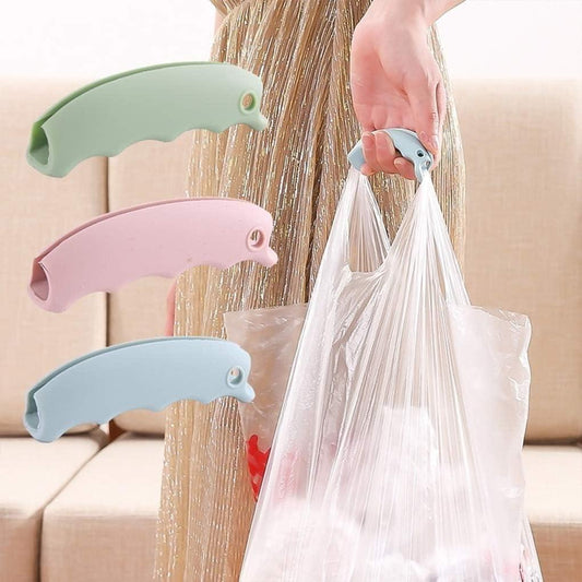 Light green and pink silicone shopping bag handles with key rings on a plastic bag