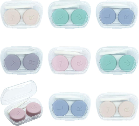 Set of travel contact lens cases with paired pastel lens caps in clear plastic trays