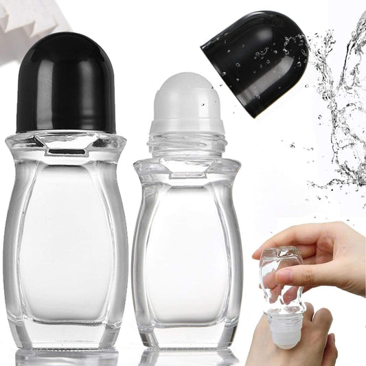 Set of clear glass roller bottles with black caps and plastic roller ball tips