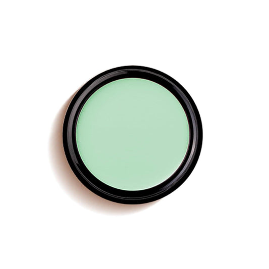Green concealer foundation cream pan in a round black compact case