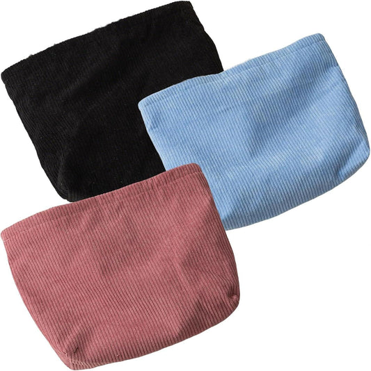Corduroy cosmetic bag set of three with zippers in black, blue, and pink.