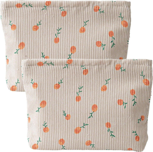 Two corduroy cosmetic bags, off-white with orange cherry pattern and zipper closure