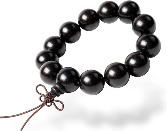 Dark wooden beaded prayer bracelet with elastic string and knot tie.