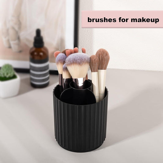Black makeup brush holder with upright brush slots and multiple brushes in container