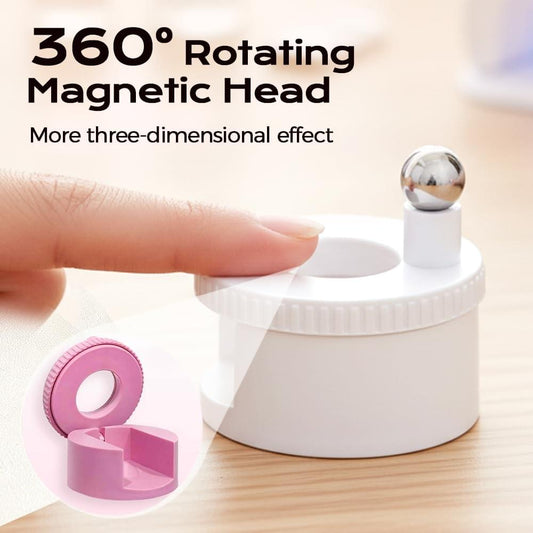 Rotating cat eye nail magnet tool with steel ball on white base