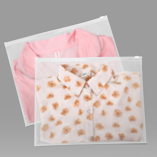Frosted resealable plastic bags, pink fabric and patterned fabric inside