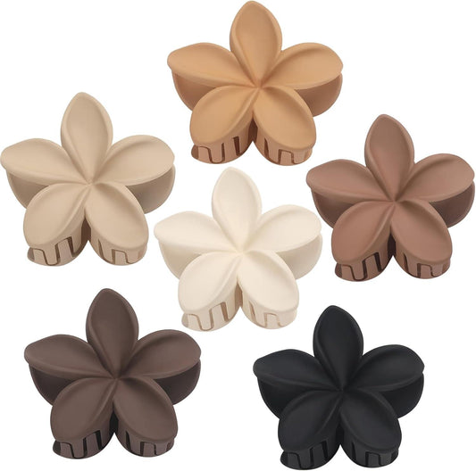 Set of flower claw hair clips with beige, white, brown, and black petals