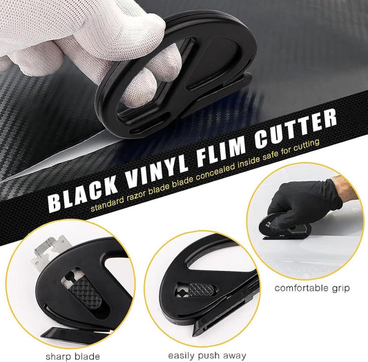 Black vinyl film cutter tool shown being held, with concealed blade slot