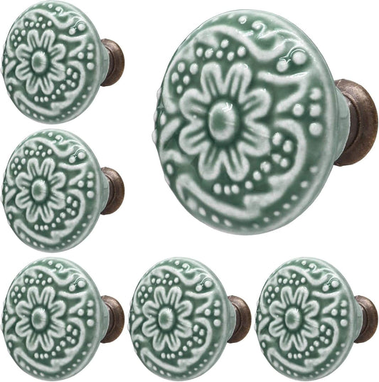 Round green ceramic cabinet knobs with floral embossed pattern and metal stem