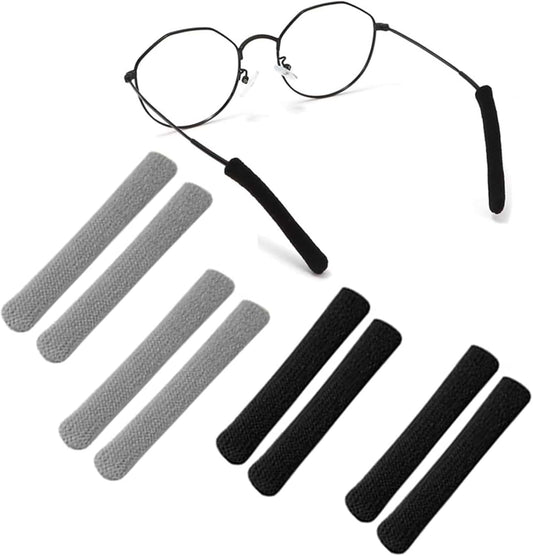 Glasses ear grips set with soft gray and black cushioning pads