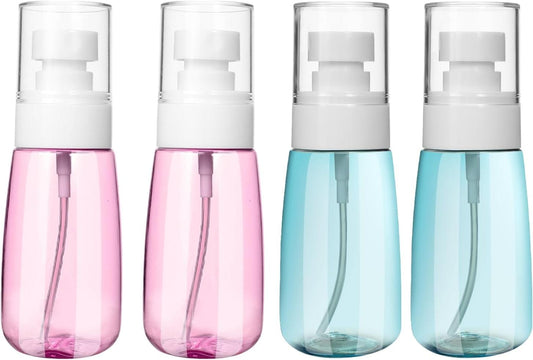 Small mini travel spray bottle with fine-mist nozzle, pink and clear body