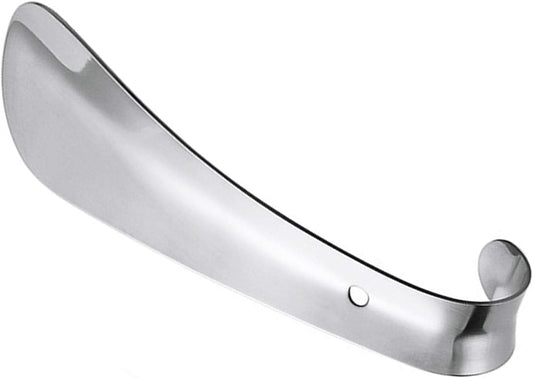 Stainless steel shoe horn with spoon-shaped tip and rounded handle, side view
