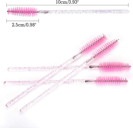 Pink disposable lash brush applicators with clear glitter handles and spool bristles