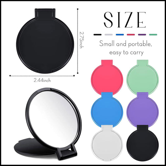 Round black pocket compact mirror on a small stand
