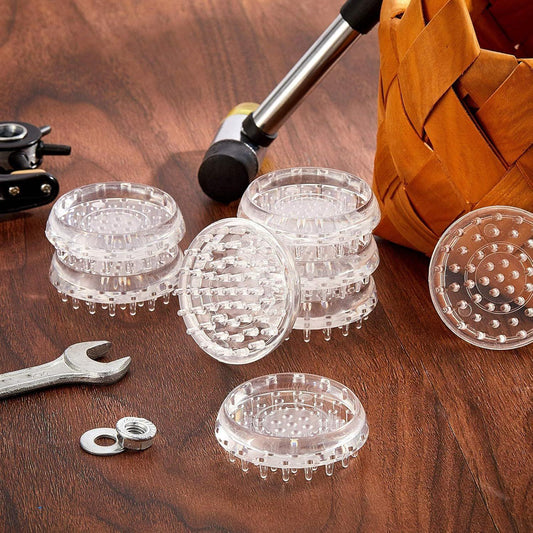 Clear spiked caster cup protectors with translucent plastic domes and included fasteners