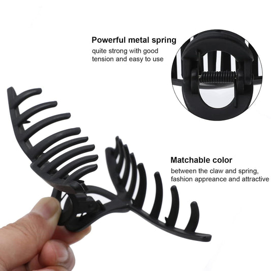 Matte black large claw hair clip with metal spring hinge and ridged teeth
