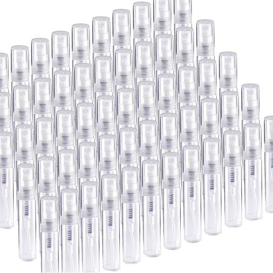Set of clear mini spray bottles with white pump heads, plastic atomizers