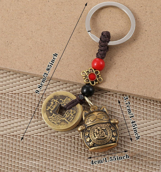 Feng shui keychain with round coin charm, smiling cat, black beads, red bead, tassel