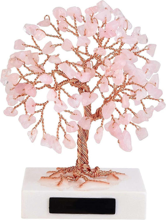 Rose quartz crystal tree of life decor with copper wire trunk on white marble base