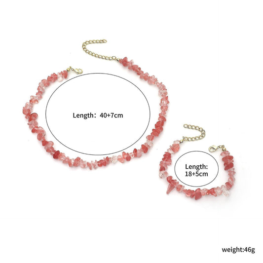 Pink beaded natural stone bracelet with gold-tone chain clasp