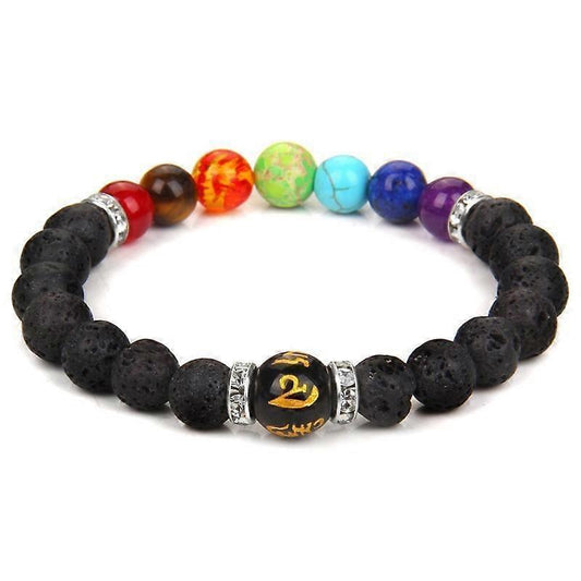 Black lava rock bead bracelet with colorful chakra stones and a gold-toned center charm