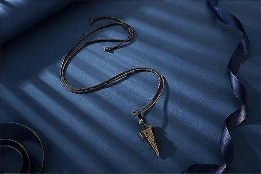 Black rope necklace with small bead clasp and brown crystal point pendant