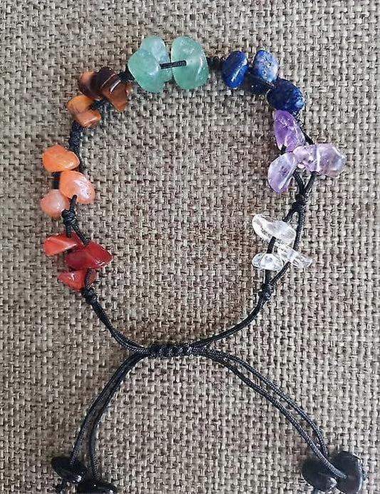 Colorful chakra gemstone bracelet with multicolor chips on black cord, adjustable
