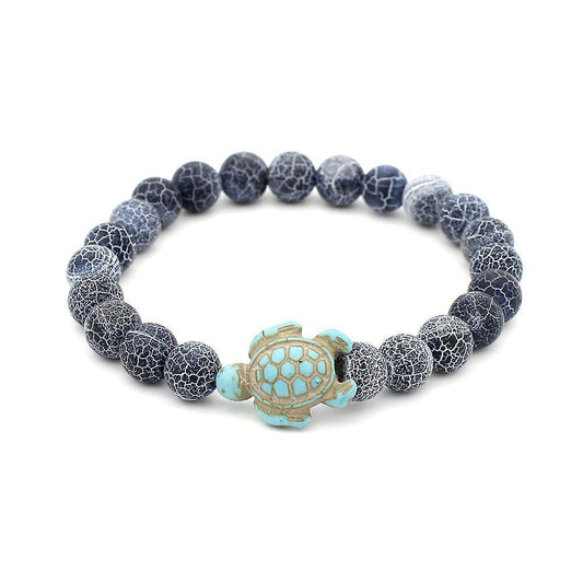 Dark blue crackle stone bead bracelet with turquoise turtle centerpiece, elastic stretch