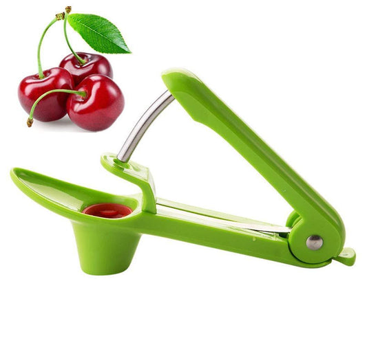 Green cherry pitter tool with stainless-steel pusher and red cup