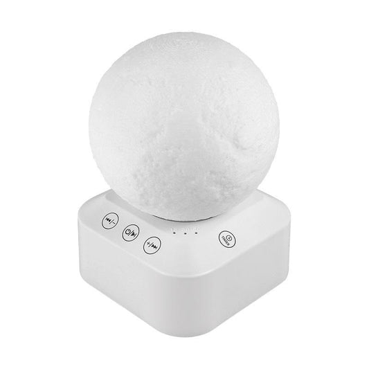 Portable white noise machine, round top and white button panel on compact base