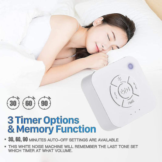 Portable white noise machine on bedside, timer dial and control buttons visible