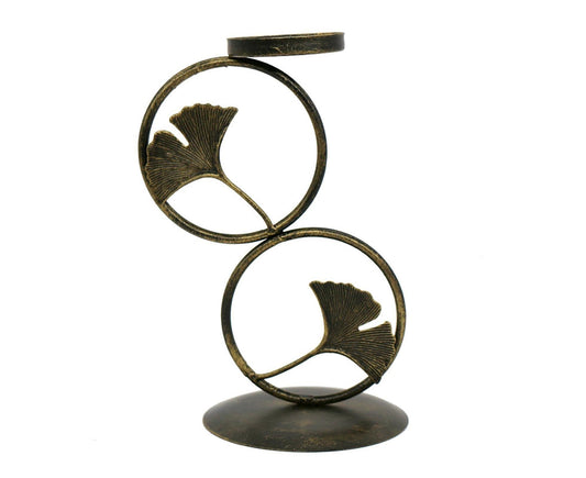 Gold-tone double-ring candlestick holder with leaf motif and dark metal base