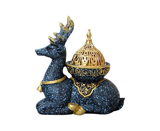 Dark blue reindeer incense holder with gold bowl and decorative gold lid