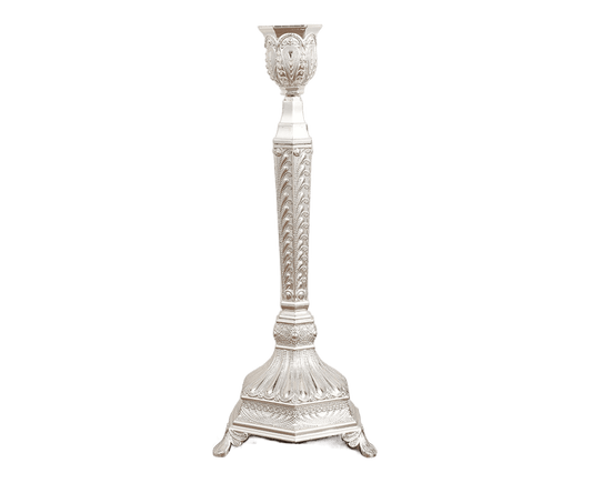 Glossy silver candlestick holder with ornate fluted column and wide base