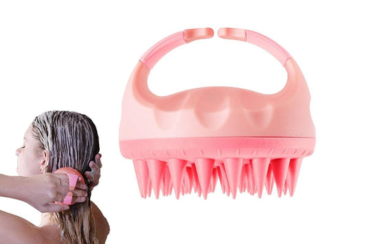 Pink hair scalp massager brush with silicone bristles and loop handle