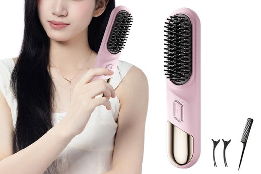 Cordless heated straightening brush in pink, shown with black bristle head and accessories