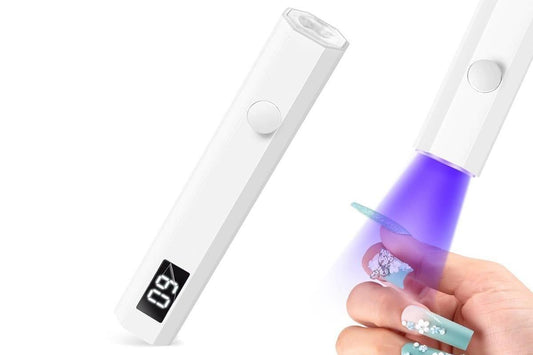 White handheld UV nail lamp for gel nails with round control button and display
