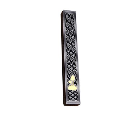 Black incense stick holder with ornate wave pattern and small flower medallion