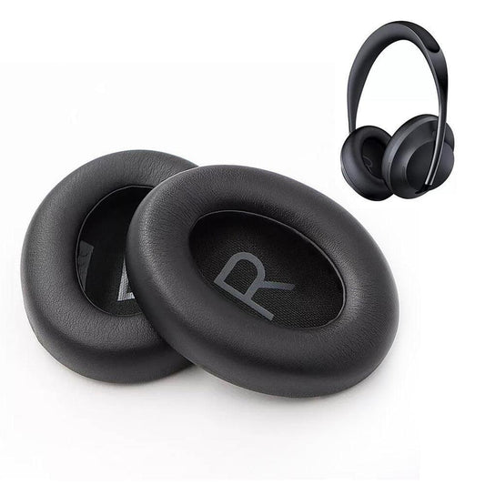 Pair of black replacement ear cushion pads with L marking, oval center opening