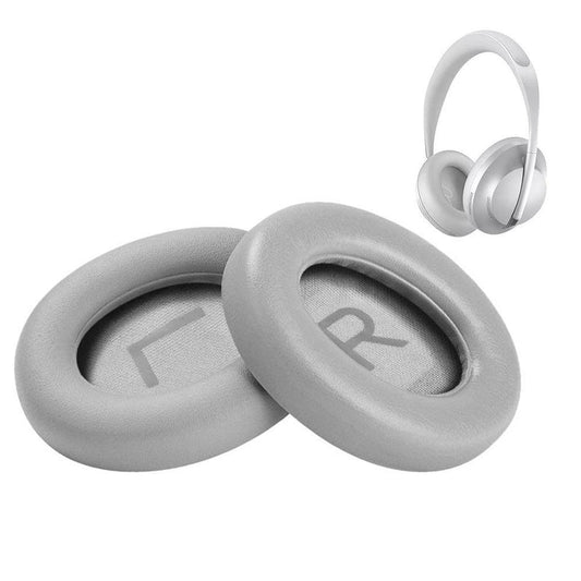 Pair of grey replacement cushion ear pads with oval openings