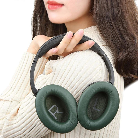Pair of green oval ear cushions with L and R on the inner face