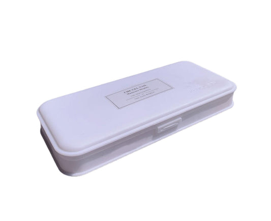 White plastic nail tools organizer box with label