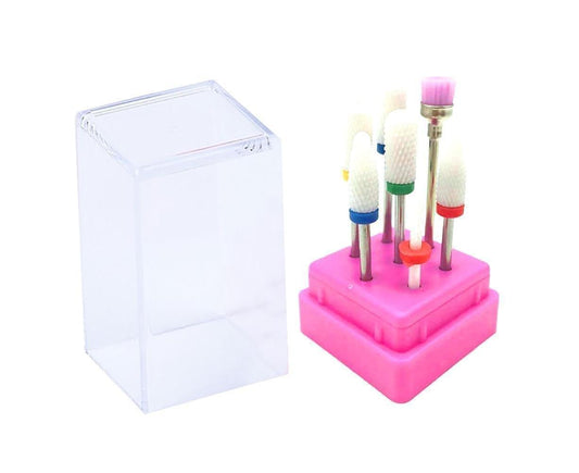 Nail drill bit set with ceramic heads on pink holder and clear storage box