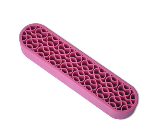Pink silicone nail brush holder with wavy molded slots