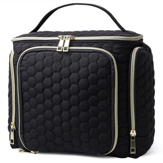 Quilted black travel makeup bag with top handle, gold zipper trim, and front pocket sections